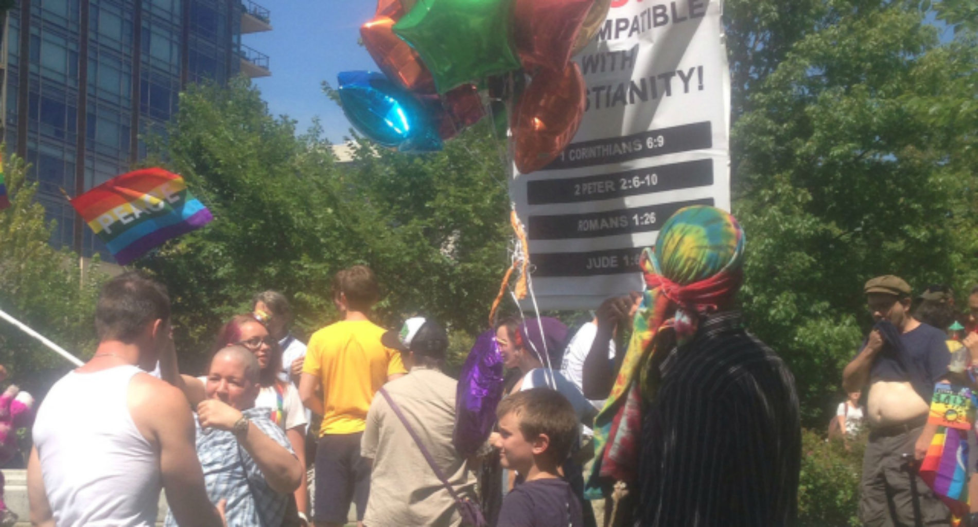 This little boy sends homophobes packing with rainbow balloons