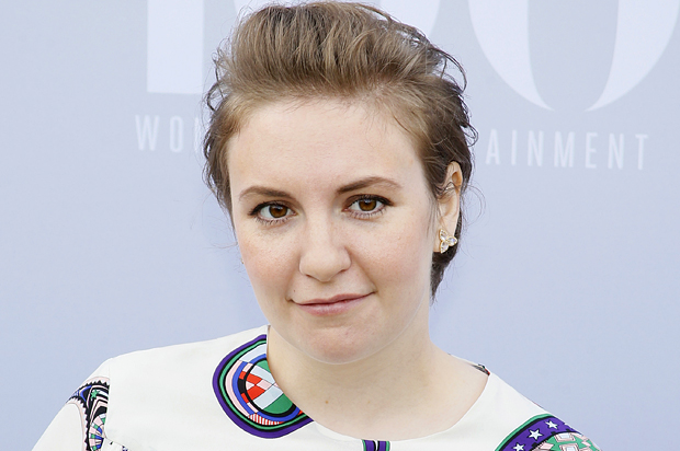 Actress Lena Dunham poses at The Hollywood Reporter's Annual Women in Entertainment Breakfast in Los Angeles